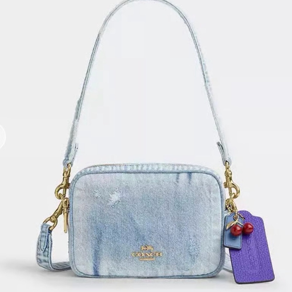 Coach Light Denim Crossbody with Purple Tag and Red Charm